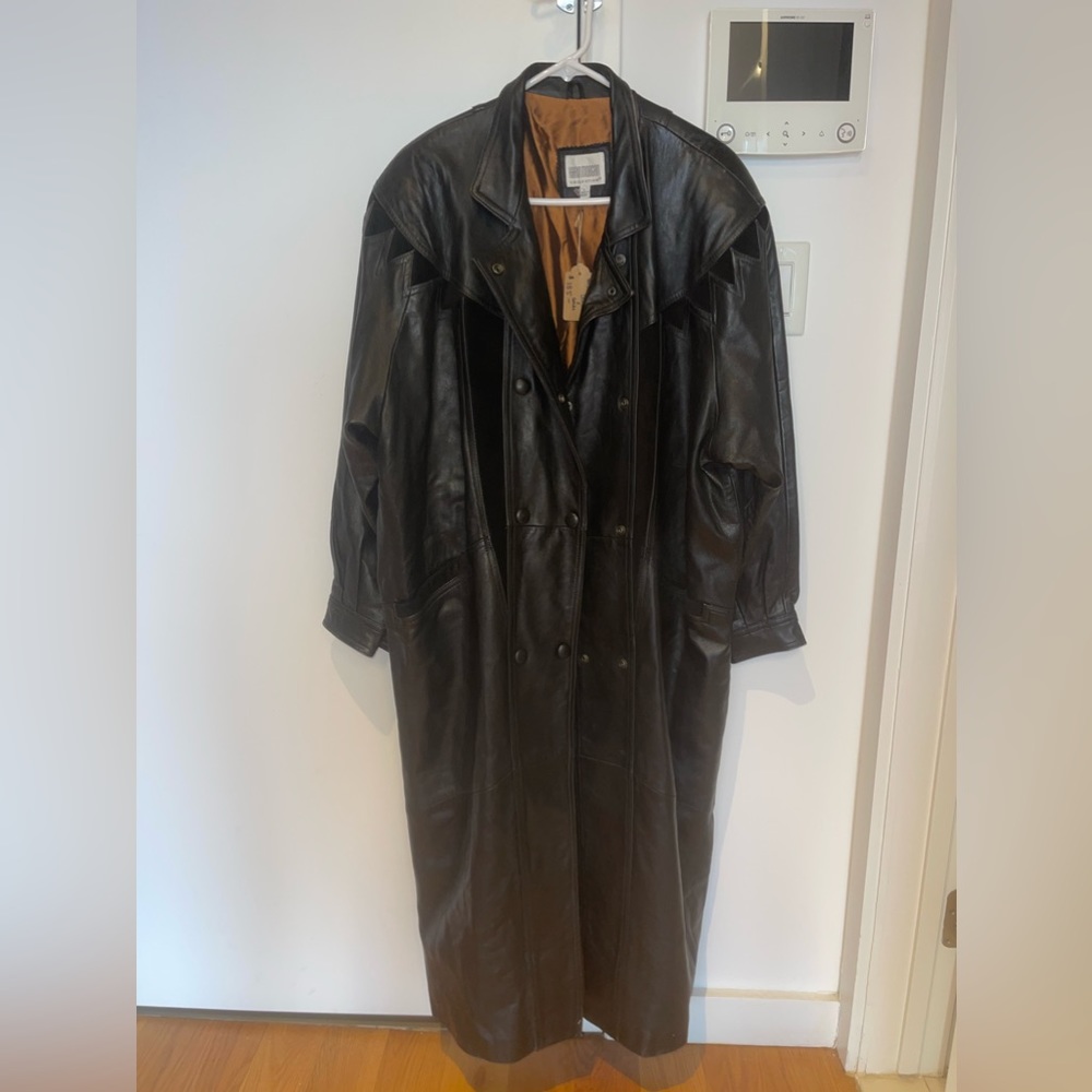 Vintage Karin Morgan Collection long black leather jacket with suede details.